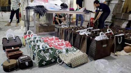 18億奢侈品涉假案震動市場，箱包銷售如何辨別真?zhèn)危? class=